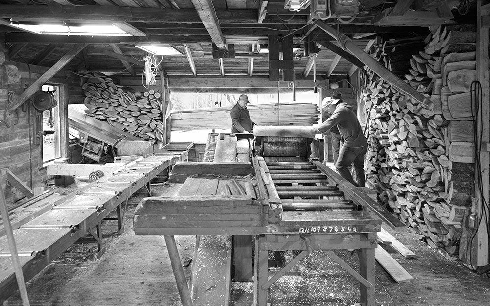 "Men at Work” in Tardif Saw Mill, family-owned and operated heritage enterprise on the right bank of the Fish River, in Fort Kent Mills, September 2021. (Courtesy photo)